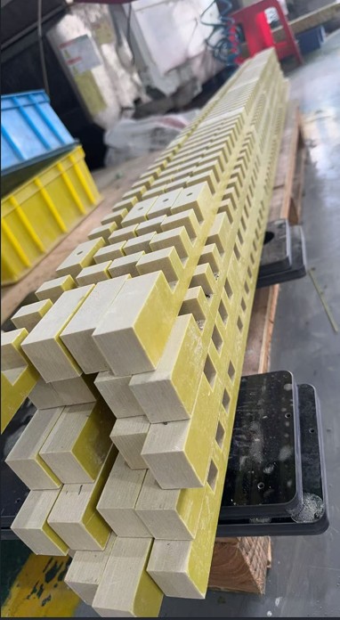 Yellow epoxy glass laminate sheets stacked